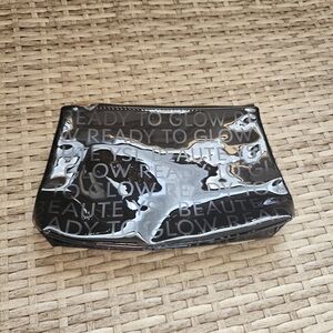 YSL Glossy Black Cosmetic Pouch